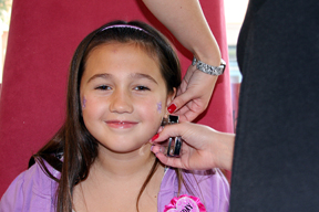 Girl getting her ears pierced by sweet and sassy
